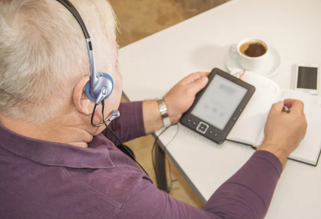 high-angle-view-man-using-laptop-table